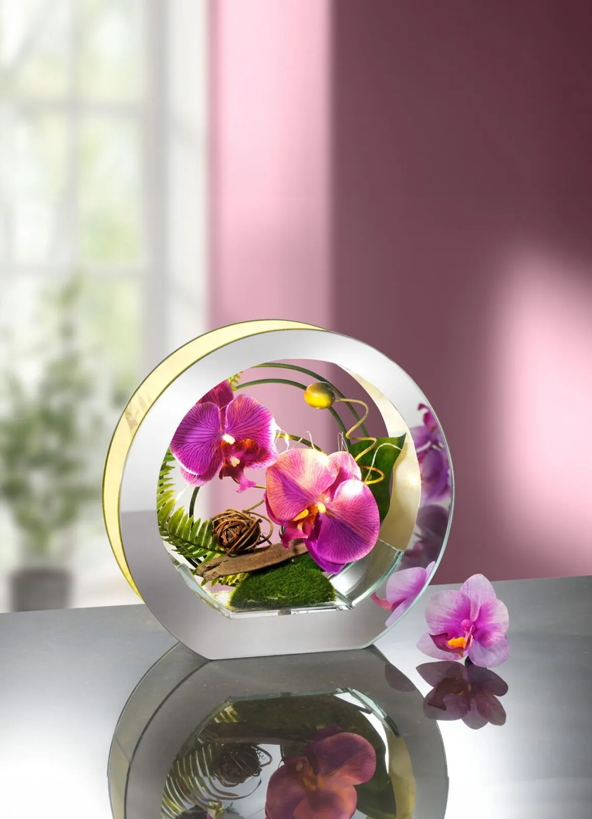 Beleuchtete Orchidee im Glas
