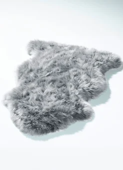 Vorleger aus echtem Lammfell in Tierform